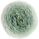 A single ball of soft, fuzzy yarn in a pale sage green color, photographed from directly above on a solid white background.