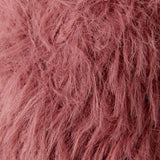 A close-up texture shot of a dusty rose pink faux fur fabric, showing the fluffy, shaggy fibers in detail.