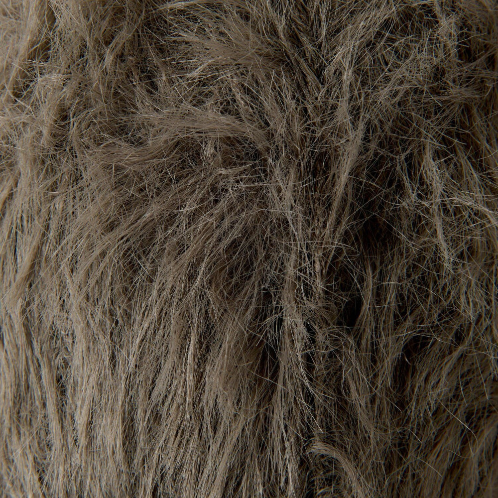 A close-up texture shot of shaggy faux fur fabric in a taupe-brown color, showing individual strands and the soft, fluffy material.