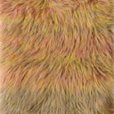 Close-up of a shaggy faux fur fabric with a variegated color pattern of pink, yellow, and beige.