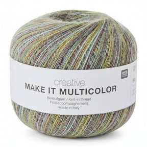 A ball of RICO DESIGN creative MAKE IT MULTICOLOR knit-in thread yarn, featuring a white paper label with black text, set against a plain white background.