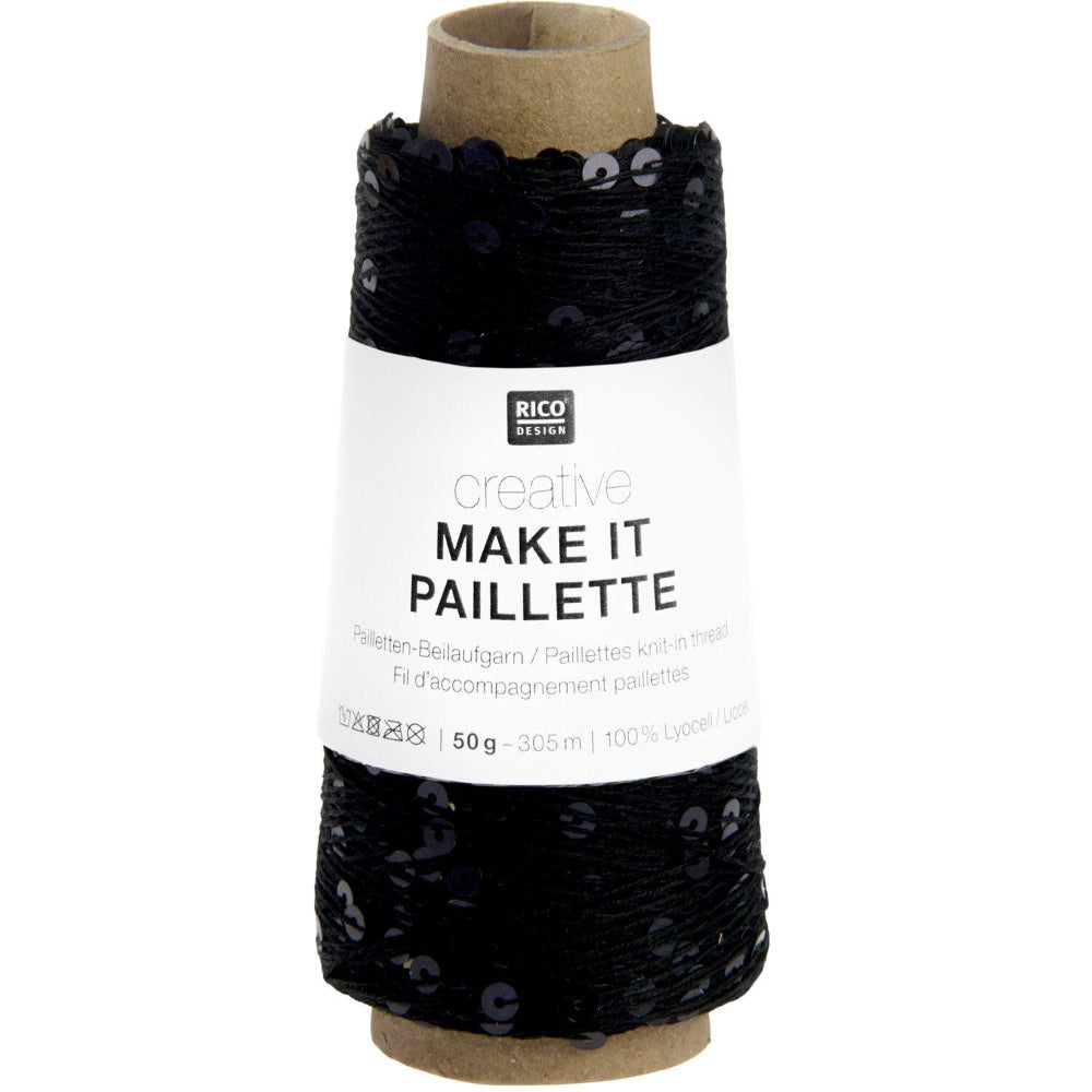 A spool of black knit thread with a white paper label reading 'RICO DESIGN creative MAKE IT PAILLETTE' on a plain white background.