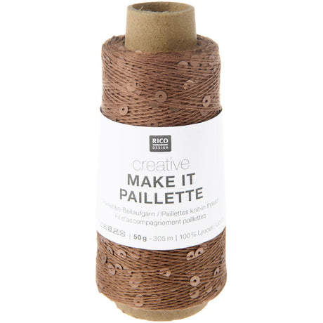 A spool of brown decorative twine with sequins, wrapped in a white paper band labeled 'RICO DESIGN creative MAKE IT PAILLETTE'.