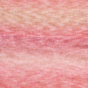 A close-up of a textured knit fabric with a marled gradient pattern transitioning from peach and beige at the top to soft pink at the bottom.