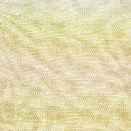 A close-up of a fine knit fabric with a soft gradient transitioning from pale yellow at the top to a warm cream/beige at the bottom.
