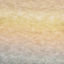 A close-up of a knitted fabric with a soft ombre gradient transitioning from pale yellow at the top through warm beige to light gray at the bottom.