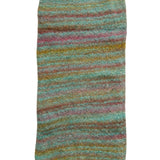A rectangular area rug with a soft, shaggy texture featuring horizontal multicolor stripes in shades of teal, pink, brown, and gold, shown against a plain white background.