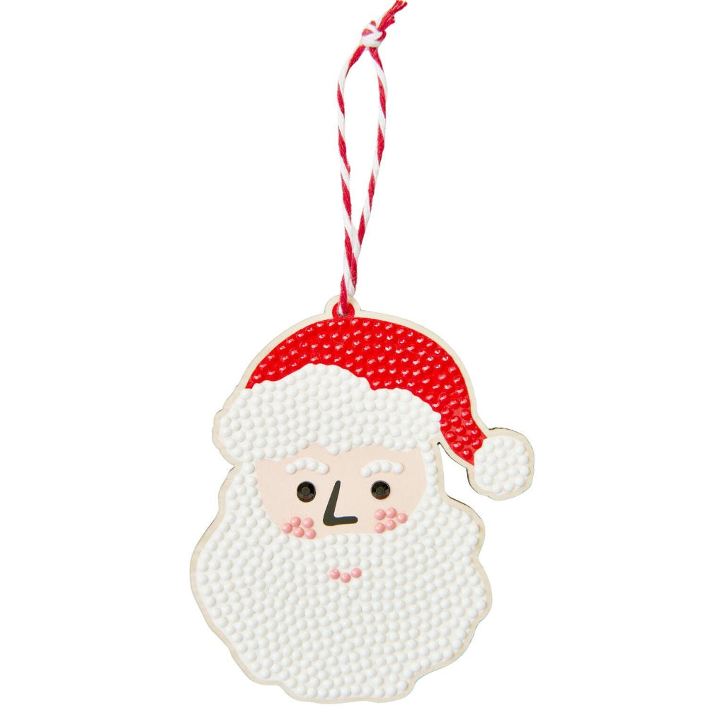 A Christmas ornament shaped like Santa's face, featuring a textured white beaded design for the beard and face, a red beaded hat, and a red-and-white striped hanging string.