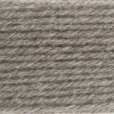 A close-up texture shot of twisted yarn in a heathered taupe-gray color, showing the fuzzy, multi-toned fibers.