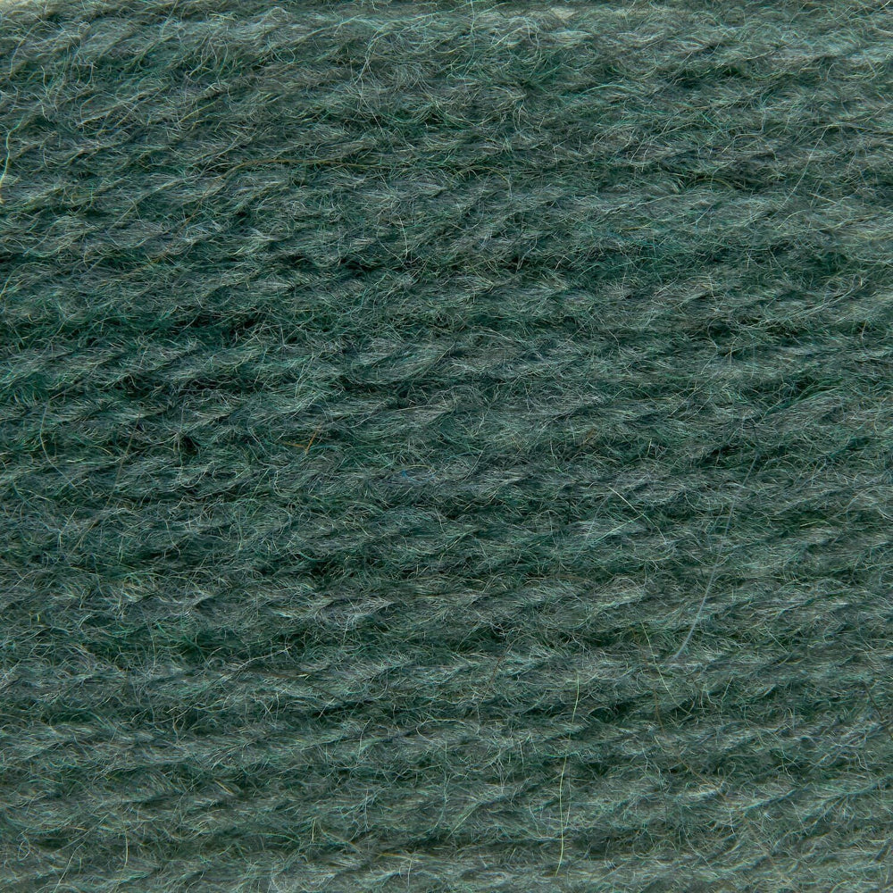 A close-up texture shot of dark teal green yarn, showing the twisted fibers and heathered color.