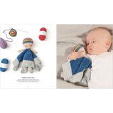 Crocheted doll with rainbow hairband and baby wearing similar outfit on a white background