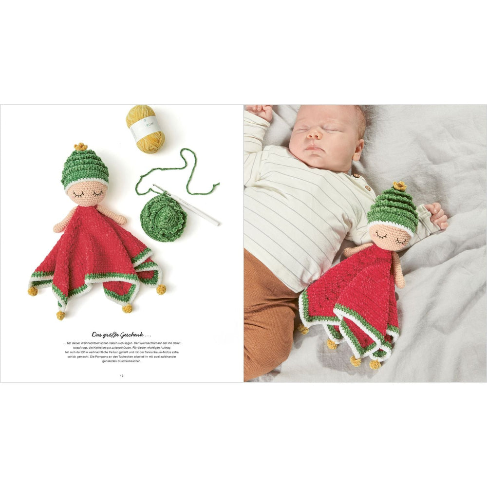 Crocheted doll in a red dress and green hat next to a sleeping baby with the same doll.
