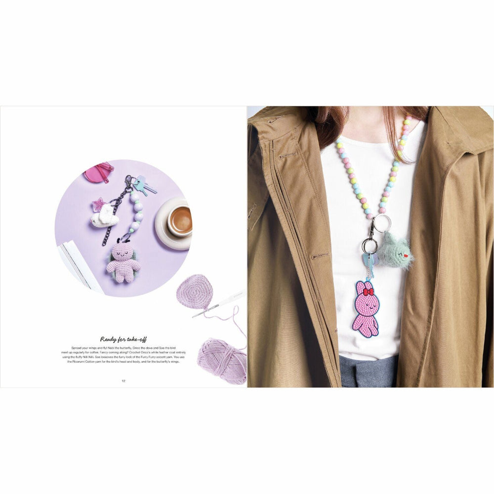 Person wearing a colorful beaded necklace with a pink character pendant, surrounded by related products on a white background.