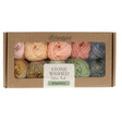 Box of Scheepjes stone washed yarn Intentions with colourful balls inside on a white background