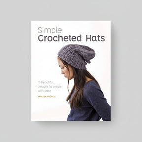 Book cover for 'Simple Crocheted Hats' by Vanessa Moonzie, featuring a woman in profile wearing a chunky crocheted slouchy hat against a clean white background.
