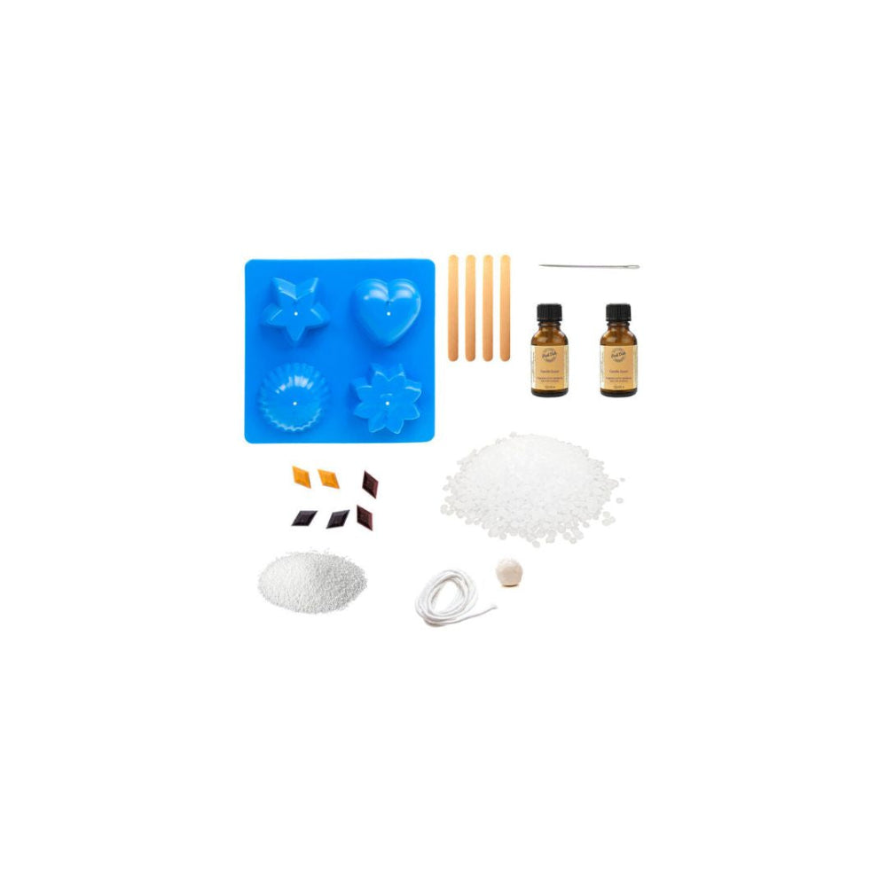 A DIY candle making kit laid out on a white background, including a blue silicone mold set, two amber bottles, wooden wicks, wax, fragrance oil, and wick flags.