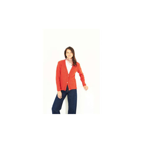 A woman modeling a textured red-orange cardigan over a white top and dark blue jeans, set against a plain white background.