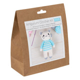 Amigurumi crochet kit packaging with a cat  illustration on a white background