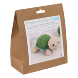Amigurumi crochet kit packaging with a tortoise on a white background