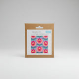 Bargello Kit packaging with floral pattern and brand label on a white background