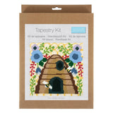 Tapestry kit packaging with a beehive design on a white background