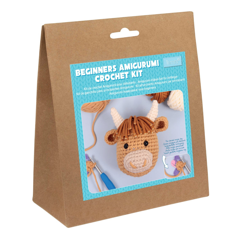 Beginners Amigurumi Crochet Kit packaging with a cow toy on a white background