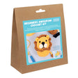 Crochet kit packaging for beginners with a lion amigurumi toy on a white background
