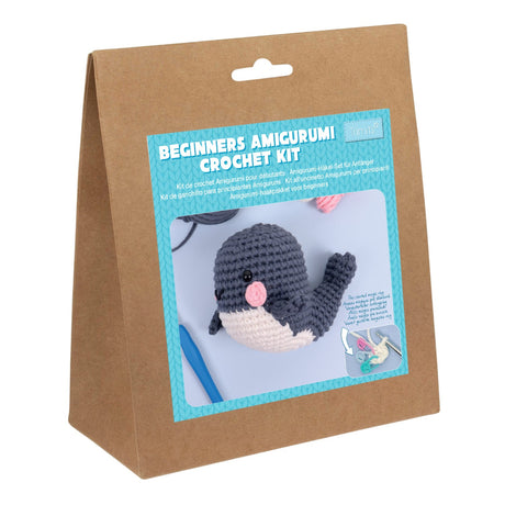 Beginners Amigurumi Crochet Kit packaging with a whale toy illustration on a brown bag.