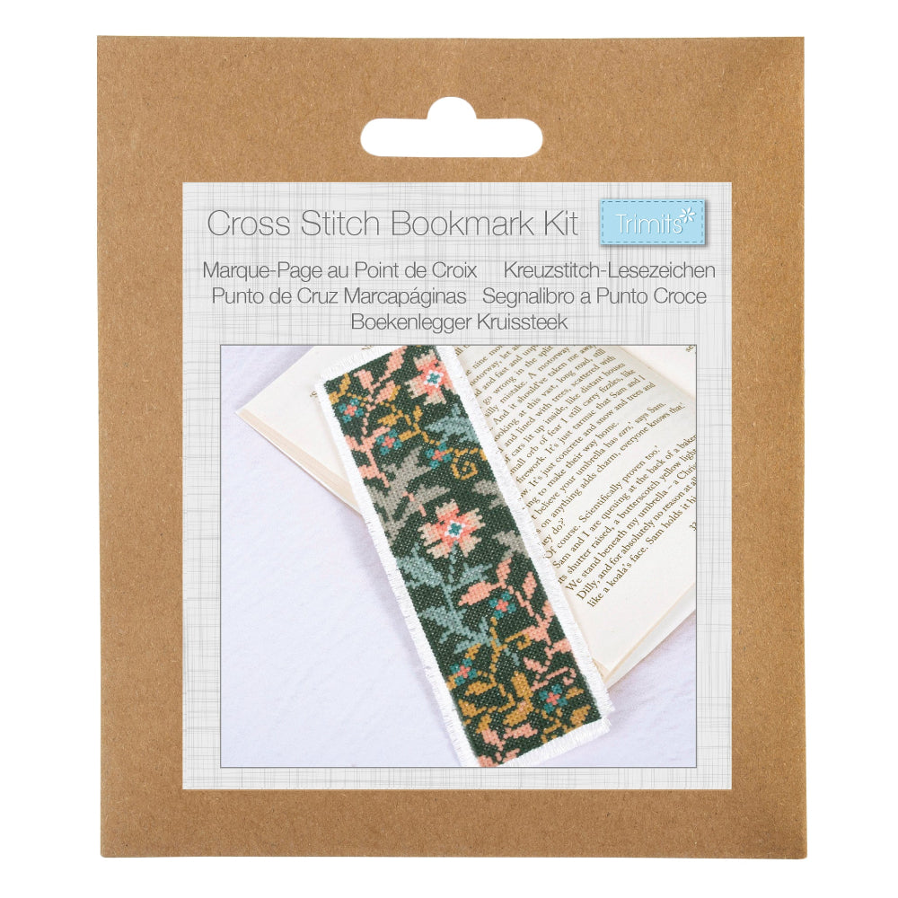 A cross stitch bookmark kit in a brown kraft paper hanging card package. The front label shows the text 'Cross Stitch Bookmark Kit' and a photo of a completed patterned bookmark placed over an open book.