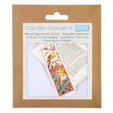 A cross stitch bookmark kit in its original brown kraft paper packaging, featuring a printed insert that shows a completed bookmark with a bird pattern.