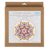 Embroidery Hoop Kit in its original brown kraft paper packaging, featuring a colorful mandala design on the front label.