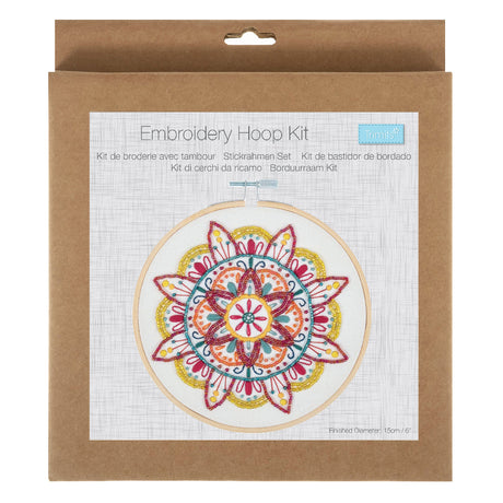 Embroidery Hoop Kit in its original brown kraft paper packaging, featuring a colorful mandala design on the front label.