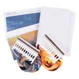 A needlework kit set including a white canvas fabric, a printed design sheet labeled GC2358 - SUNSET, two skeins of embroidery floss in blue-purple and orange-brown, and two colour swatch cards on a white background.