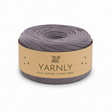 A roll of Yarnly faux leather t-shirt yarn in a muted grayish purple color, wrapped in a kraft paper band with the brand name 'YARNLY' printed on it, set against a plain white background.
