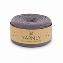 A roll of Yarnly faux leather t-shirt yarn in a muted grayish purple color, wrapped in a kraft paper band with the brand name 'YARNLY' printed on it, set against a plain white background.