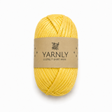 A skein of yellow yarn with a brown paper label reading 'YARNLY LUSTRE T-SHIRT YARN' on a plain white background.