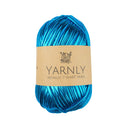 Blue skein of yarn with a Yarnly label on a white background