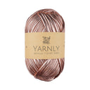 Ball of metallic rose gold yarn with Yarnly label on a white background