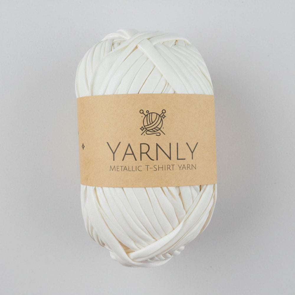 Ball of white yarn with a brown label on a white background