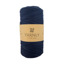 Navy blue yarn ball with a Yarnly label on a white background