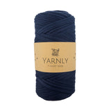 Navy blue yarn ball with a Yarnly label on a white background